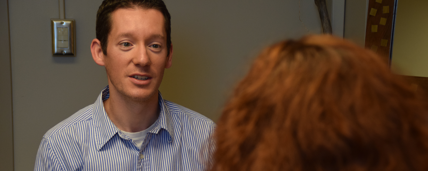 Employee talking with clinician