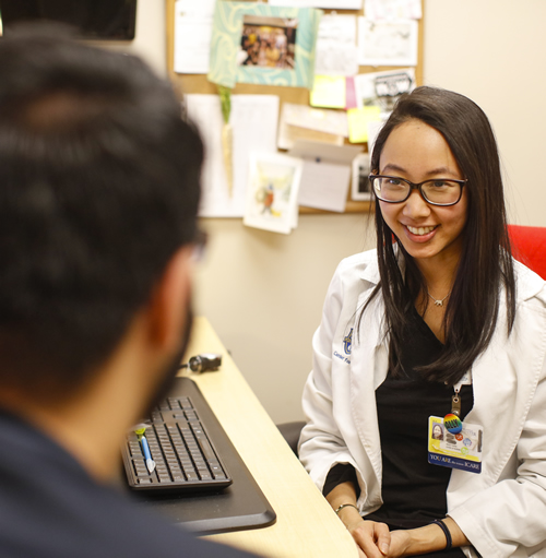 Nurse Speaking with Client